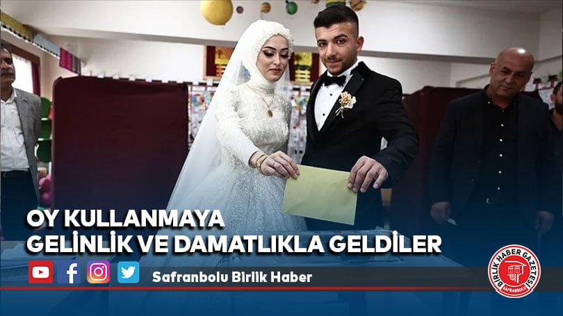 Oy kullanmaya gelinlik ve damatlıkla geldiler