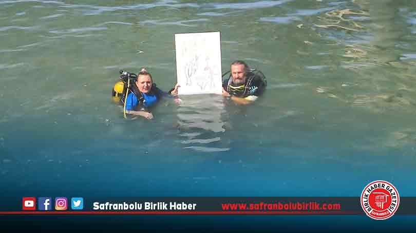 Van Gölü konusunda farkındalık oluşturmak için su altında resim çizdi