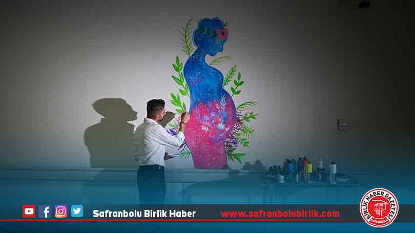 Çalıştığı hastanenin duvarlarını resimlerle süsleyen engelli temizlik görevlisi resim öğretmeni oldu