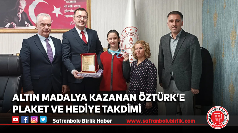 Altın Madalya Kazanan Öztürk’e  Plaket ve Hediye Takdimi