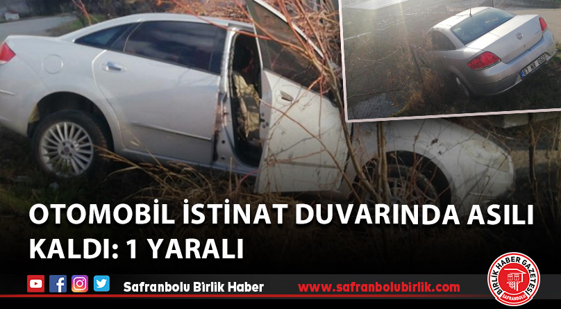 Otomobil istinat duvarında asılı kaldı: 1 yaralı