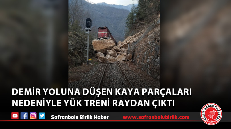 Demir yoluna düşen kaya parçaları nedeniyle yük treni raydan çıktı