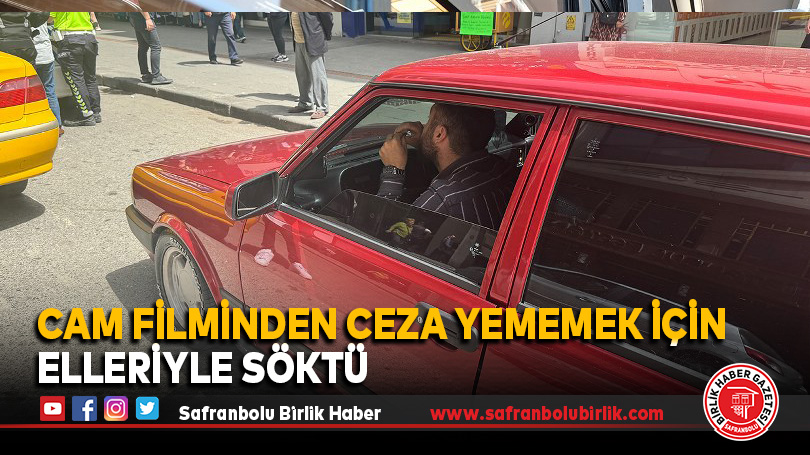 Cam filminden ceza yememek için elleriyle söktü