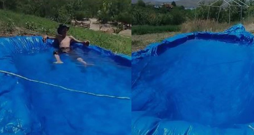 Sıcaktan bunalan çocuklardan ilginç serinleme yöntemi