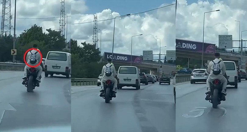 Ceza yememek için düşen plakasını sırt çantasına yapıştırdı