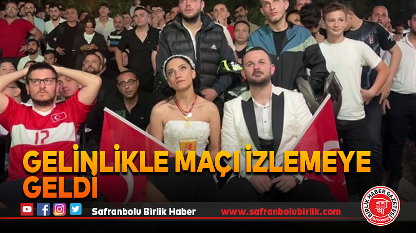 Gelinlikle maçı izlemeye geldi