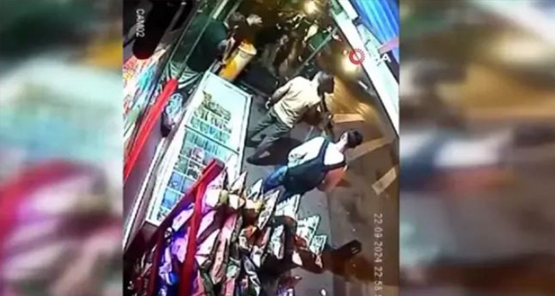 Polisin silahını alıp ateş açtı