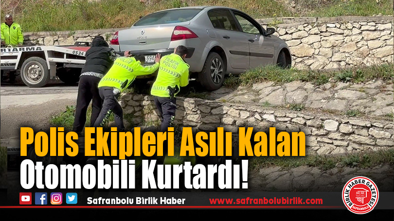 Polis Ekipleri Asılı Kalan Otomobili Kurtardı!