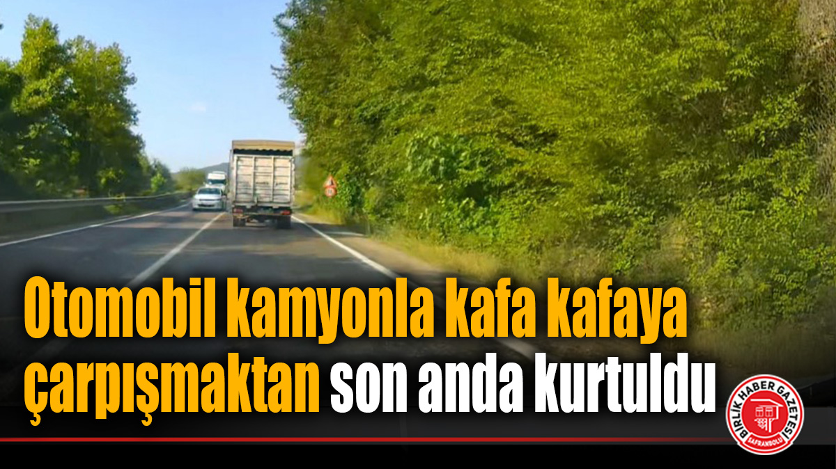 Otomobil kamyonla kafa kafaya çarpışmaktan son anda kurtuldu