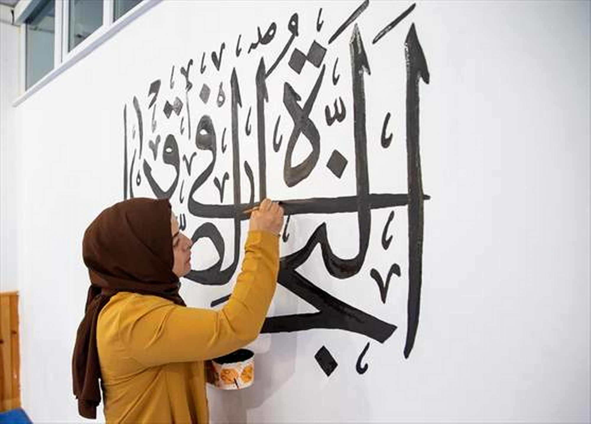 Kadınlar hat sanatını cami ve mescit duvarlarına taşıdı